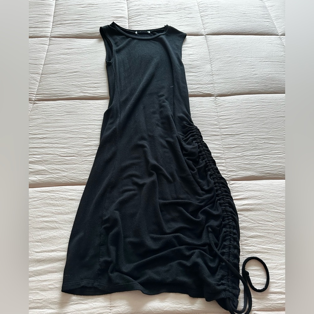 Black bodycon mini dress with rouche detail
